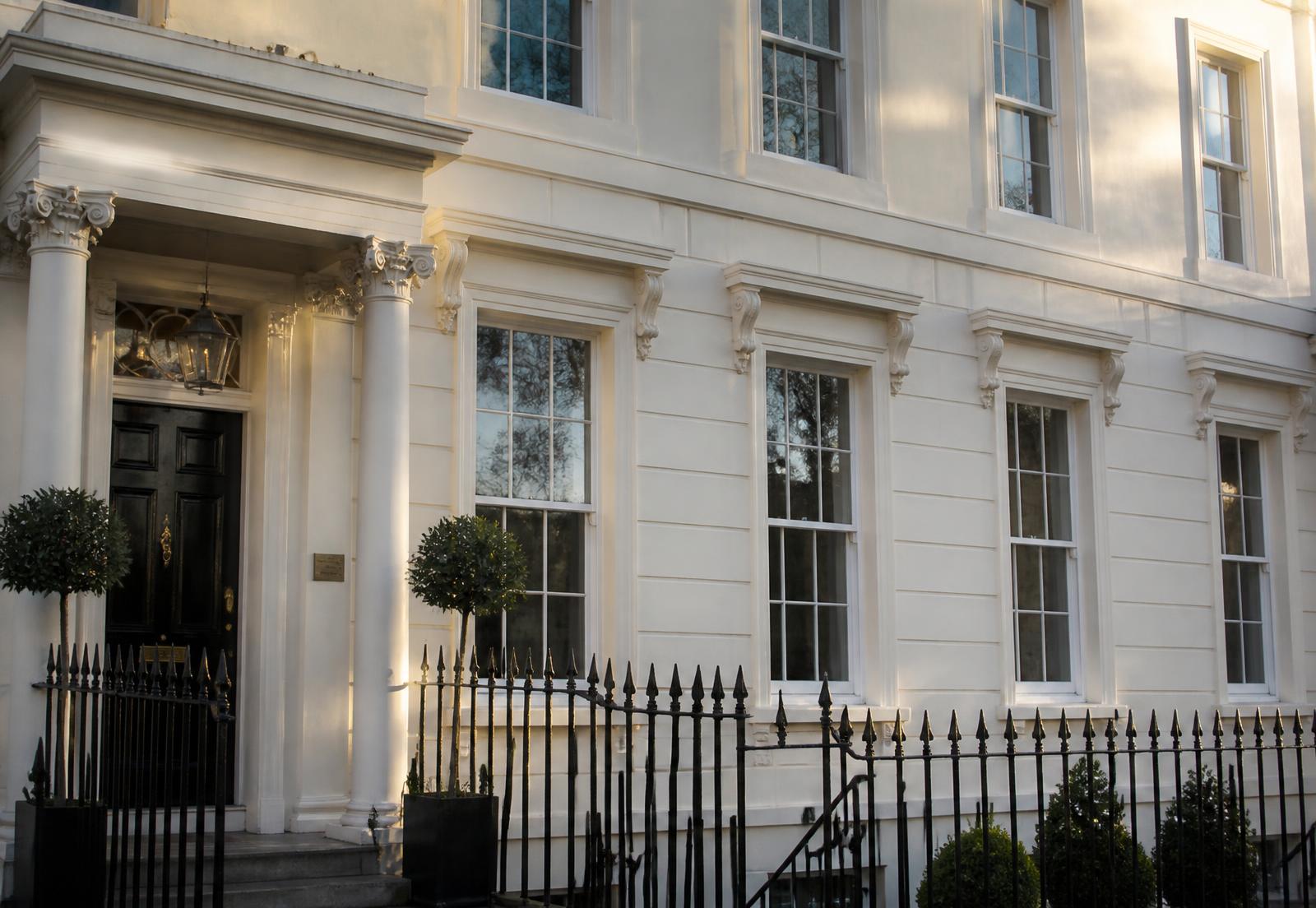 Restored timber sash windows on a Georgian townhouse in Bath